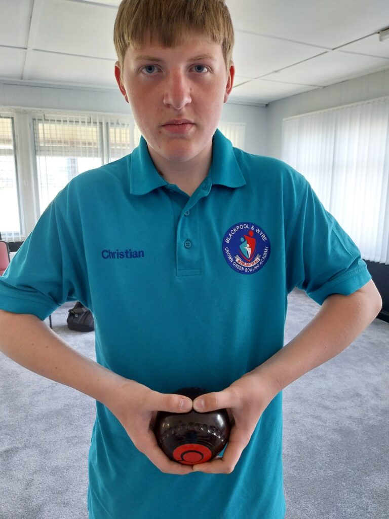 Chriatian holding a bowl