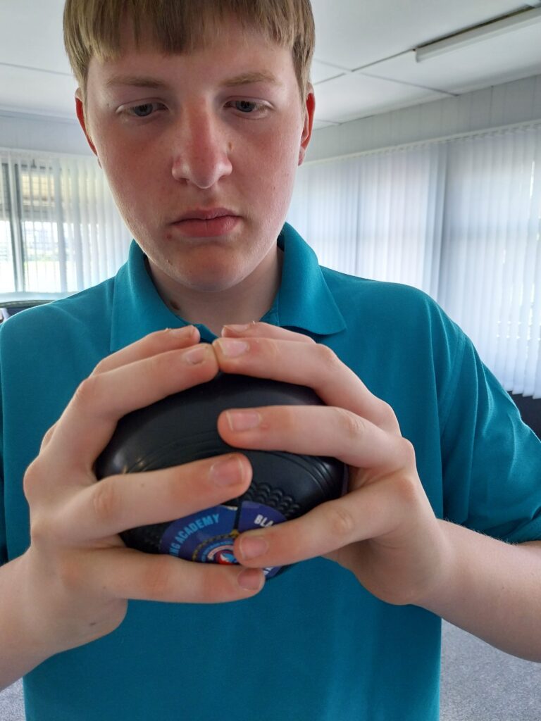 Christian holding a bowl