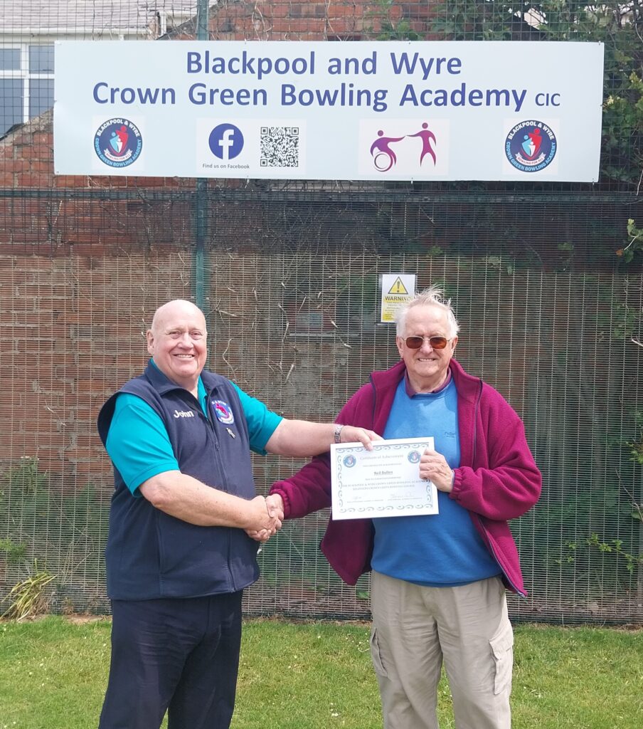 Neil receives his certificate