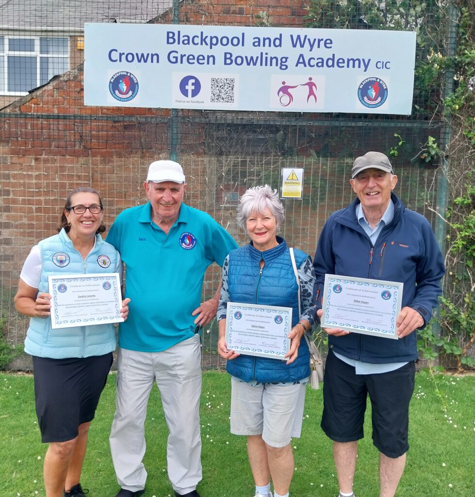 Three academy graduates receive their certificates