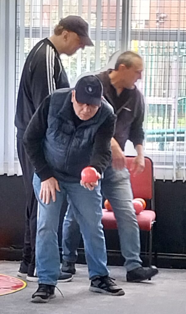Bowler delivering bowl